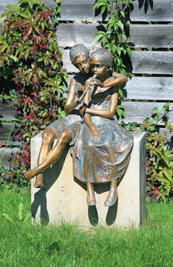 Bronzefigur Paar mit Flöte von Pawel Andryszewski