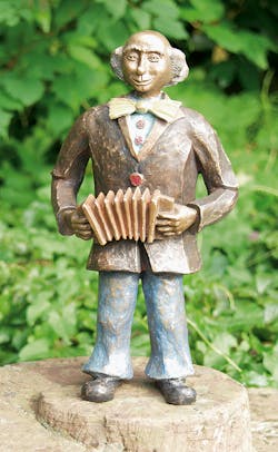 Bronzefigur Clown mit Harmonika von Kurt u. Bruno Eggenberger